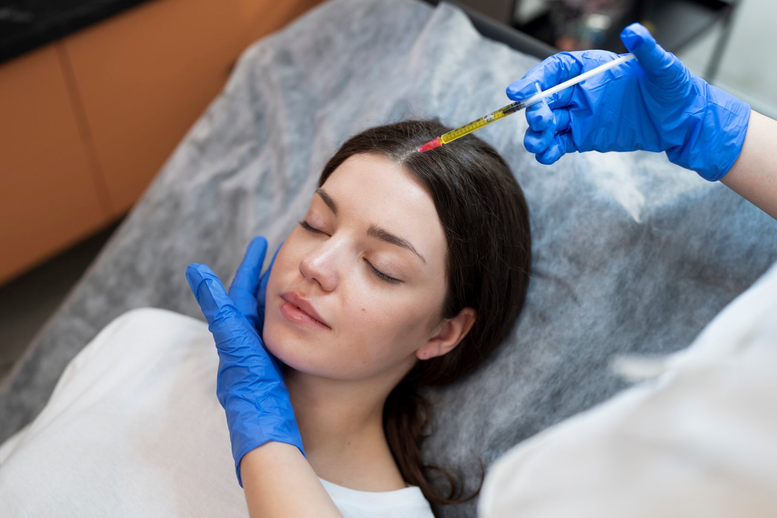 young-woman-getting-prp-injection-high-angle